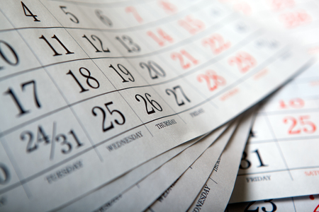 pile of wall calendar sheets close upの写真素材