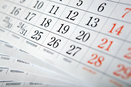 pile of wall calendar sheets close upの写真素材