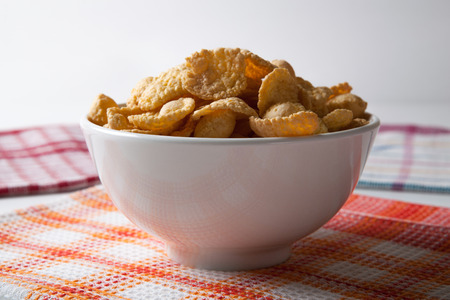 Bowl with popcorn and napkins close up