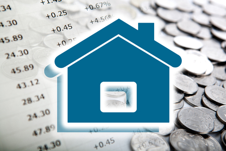 symbol of the house and a bunch of Russian coinsの写真素材