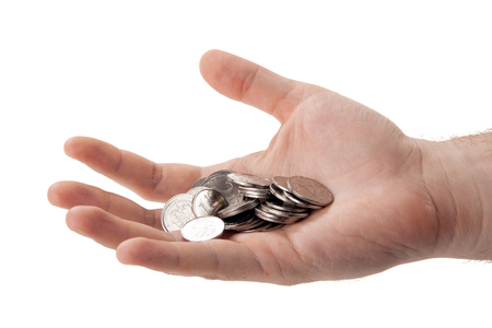 Russian ruble coins in the palm of a person isolatedの写真素材