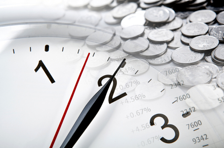 clock face and Russian ruble coins and digits closeupの写真素材