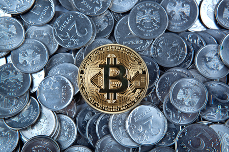 gold coin bitcoin on russian ruble coins close upの写真素材