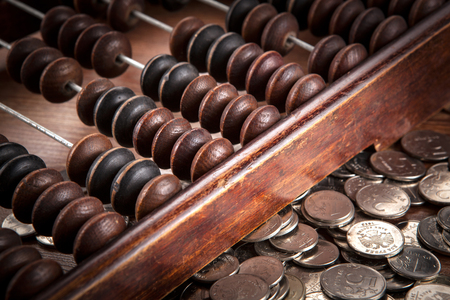 old abacus with russian ruble coins close upの写真素材