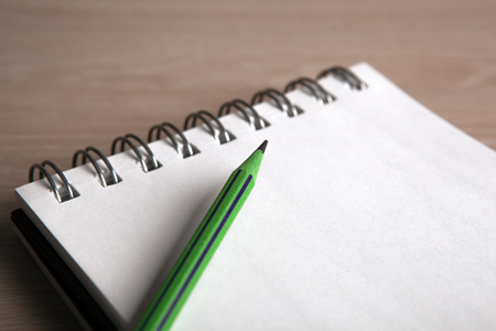 open notebook with the one simple pencil close upの写真素材