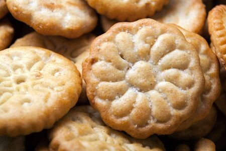 handful of crusty baked crackers close upの写真素材