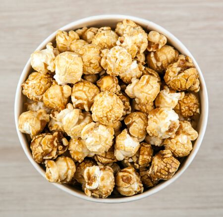 big cardboard cup with sugar popcorn top viewの写真素材