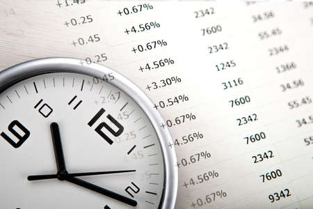 large white clock face with economic digitsの写真素材