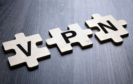 Three puzzle pieces with inscription VPNの写真素材