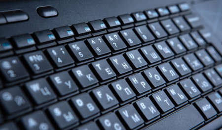 closeup of black computer keyboard keys and lettersの写真素材