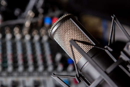 sound mixer and faders with condenser microphone DJ discoの写真素材