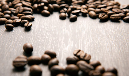 coffee beans on a wooden backgroundの写真素材