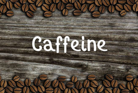 coffee beans with inscription caffeine on a wooden background illustrationの写真素材