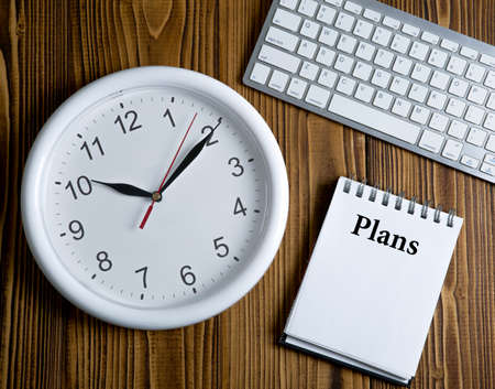 diary and office supplies and clock plansの写真素材