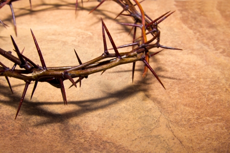 Crown of thorns over brown marble background, copy spase. Christian concept of suffering. Crown of thorns over brown marble background, copy spase. Christian concept of suffering.