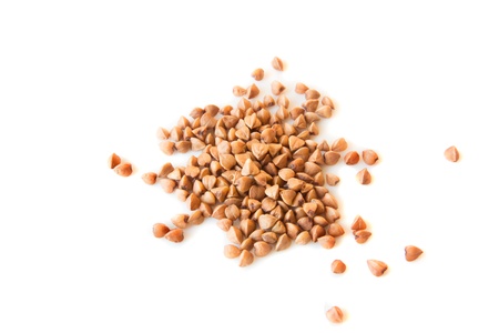 Buckwheat raw brown seeds isolated on white, close up, horizontalの写真素材