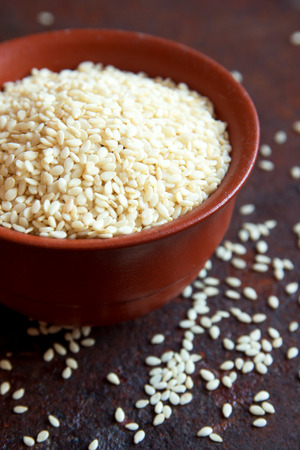 Sesame seeds in bowl close upの写真素材