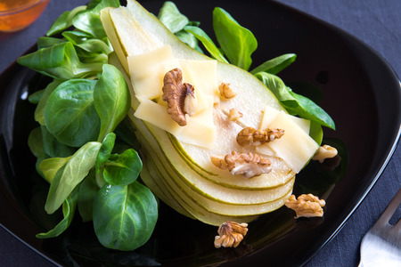 Pear salad with parmesan cheese and walnutsの写真素材