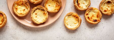 Portuguese custard tarts Pastel de Nata. Traditional Portuguese pasties for breakfast on white...