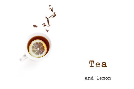 Lemon Tea in cup and dry tea leaves isolated on white background. Black Tea with Lemon.の写真素材