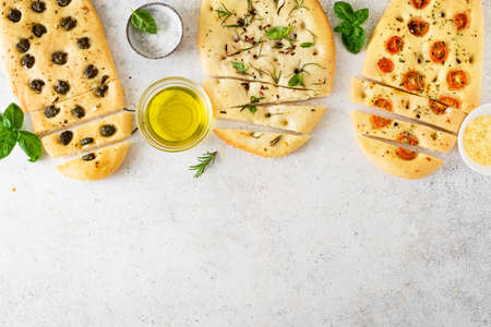 Italian Focaccia Bread with various vegetable filling. Fresh baked focaccia with tomatoes, olives,...