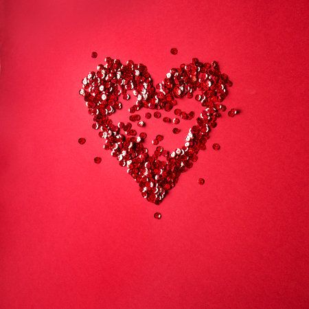 Red Heart on red background, romantic love and Valentine's Day concept, top view, copy space.