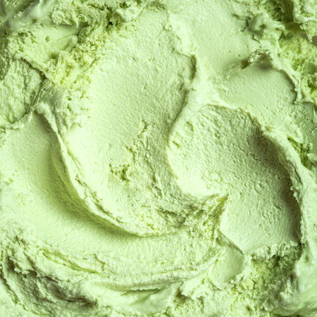 Pistachio ice cream texture, square background. Homemade green vegan ice cream or gelato closeup.の写真素材