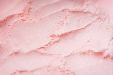Pink watermelon ice cream texture, background for design. Fruit berry strawberry icecream, creamy gelato or frozen yogurt closeup, summer food concept.の写真素材
