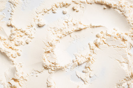 Whey protein powder detailed texture on white background, top view, design template.の写真素材