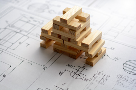 Model house from wooden blocks (bars) at the drawingsの写真素材