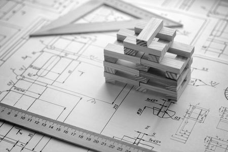 Model house from wooden blocks (bars) at the drawingsの写真素材