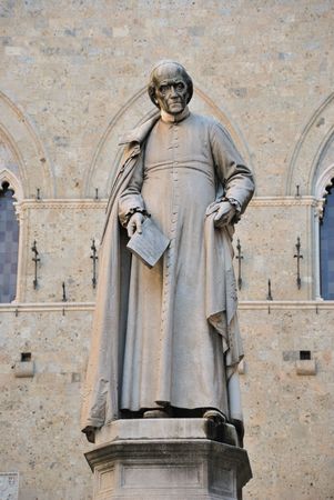 A monument in piazzza Salimbeni, in Sienaの写真素材