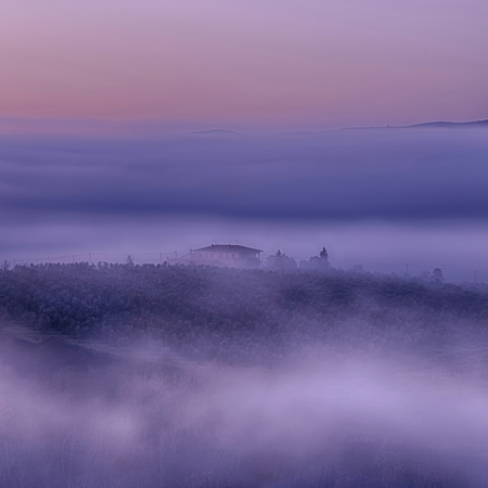 Foggy morning upon the hills of Chianti (Tuscany)の写真素材