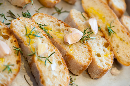 A typical italian appetizer with toated bread, garlic and olive oil
