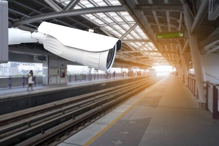 Security CCTV Camera Operating in train station buildingの写真素材