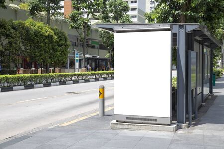 Digital Media blank advertising billboard in the bus stop, blank billboards public commercial with passengers, signboard for product advertisement designの写真素材