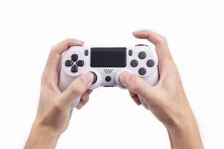 Joystick gaming controller in hand isolated on white background , Video game console developed...