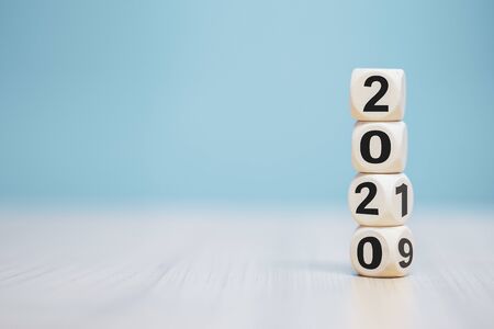 wooden cube with word 2019 change to 2020 , new year concept