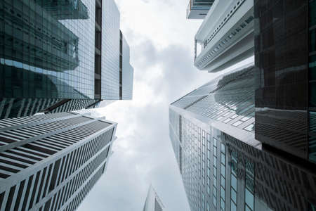View of modern business skyscrapers glass and sky view landscape of commercial building in central cityの写真素材