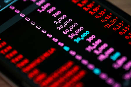 Chart in the fall or stock market going down on LED display , financial investment and economy trends conceptの写真素材