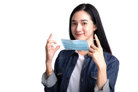 Young woman wearing medical face mask for protection corona virus or COVID-19 , Protect outbreak and...