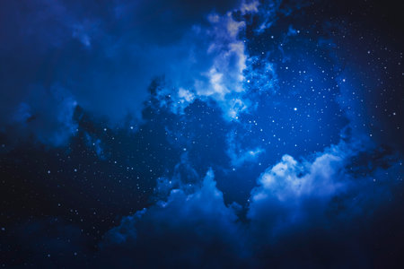 Starry night sky with stars and moon in cloudscape backgroundの写真素材