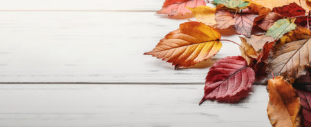 Festive autumn leaves decor on white wooden table with copy space , Textured vintage background , Generate Aiの素材