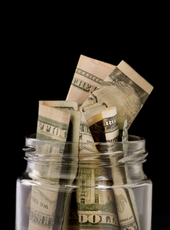 Jar full of money の写真素材