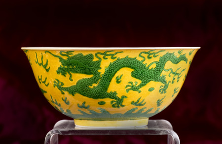  Chinese 19th century green and yellow dragon bowl , Qing dynasty.の写真素材