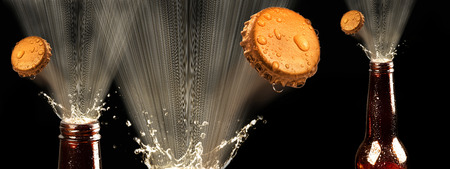 Beers popping spray and caps..の写真素材