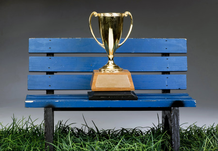A trophy on blue benchの写真素材