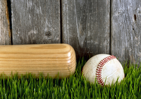 Bat and baseball with room for your type.の写真素材