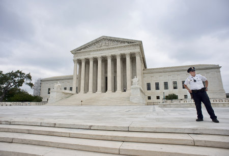 Washington DC. - Oct 7,2016:  Washington DC. Supreme Court Building with park police guarding it.のeditorial素材