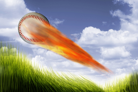 Baseball on fire speeding very fast.の写真素材